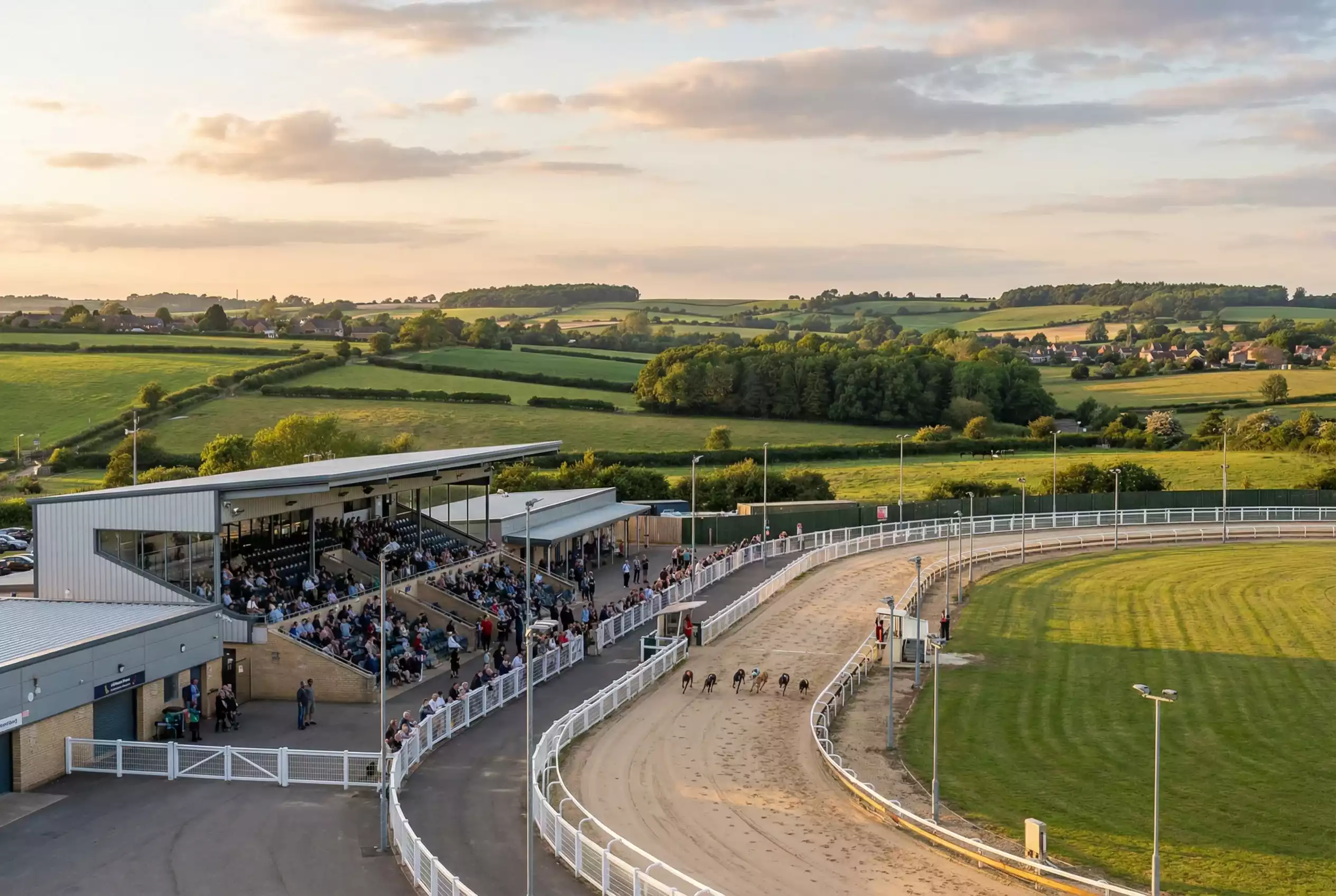Towcester Greyhound Stadium track surrounded by Northamptonshire countryside